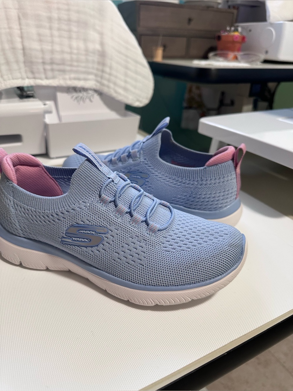 Skechers Women’s Light Blue Knit Slip-On Sneakers with Pink Heel Tab